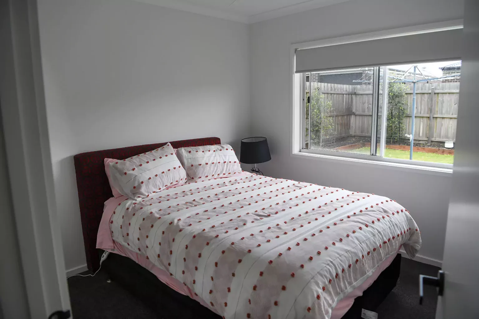 Bedroom with white bed sheets